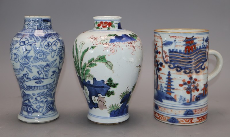 A Chinese famille verte wucai vase, a Chinese blue and white and an Imari mug, tallest 18cm